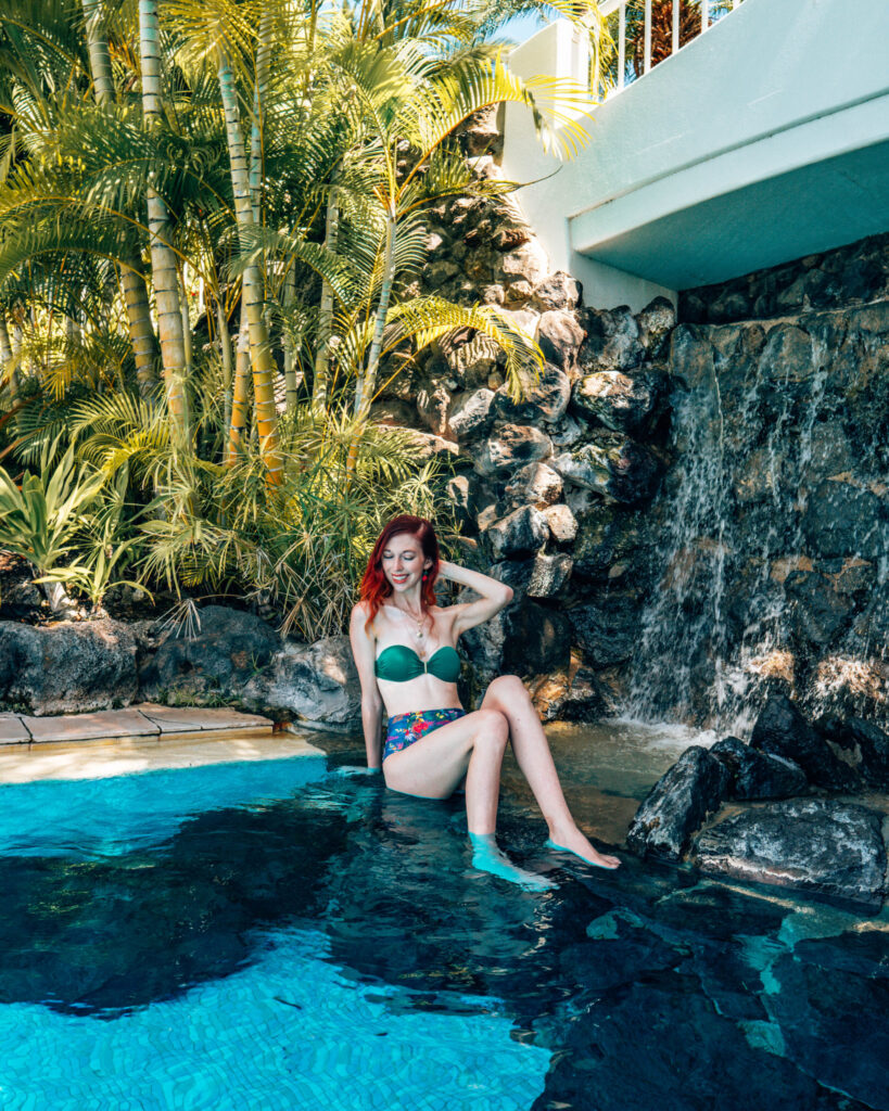 Fairmont Maui sitting in pool on a cool rock formation