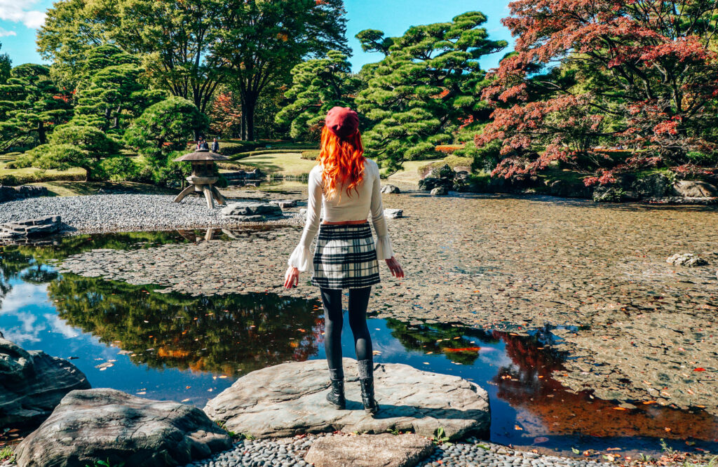 Standing on rock near flowing river