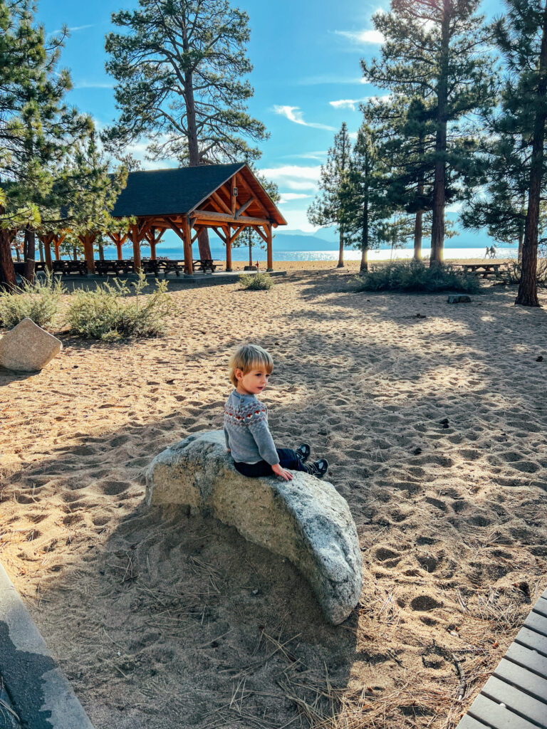 Hughie sitting on the beach Lake Tahoe