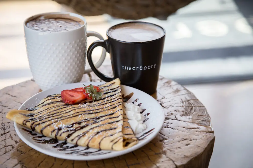 Crepe on a plate and coffee from the Crepery
